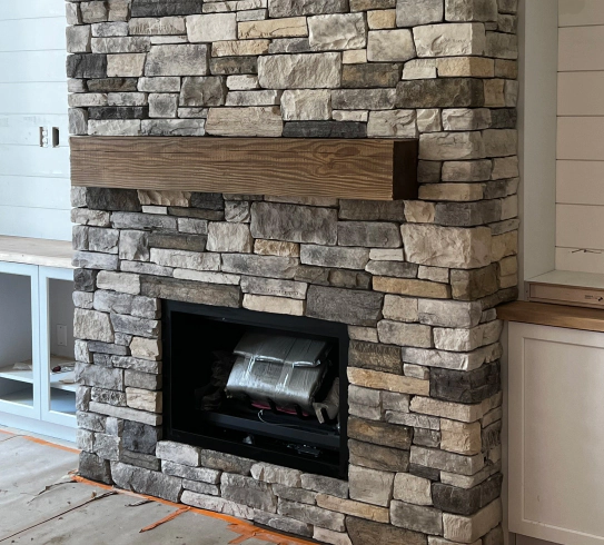 fireplace with its own masonry wall